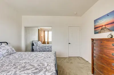 a bedroom with a bed and a dresser at Large Menifee Home 1 Block to Neighborhood Park! in Menifee