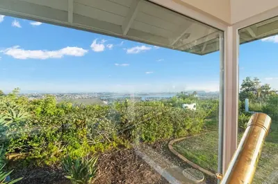 a view from the porch of a house with a view of a vineyard at Pacifica Paradise by Cardo - Ocean Views - AC - Kids Playground in San Diego