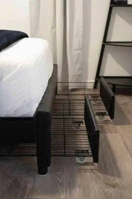 a bedroom with a bed and a glass table at Coastal Haven - Prime Spot Walk to Beach in San Diego