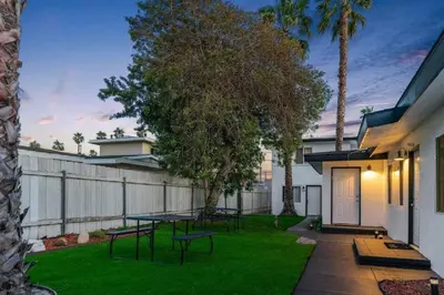a backyard with a picnic table and a fence at Beachside Bliss 2BR with Fast WiFi in San Diego
