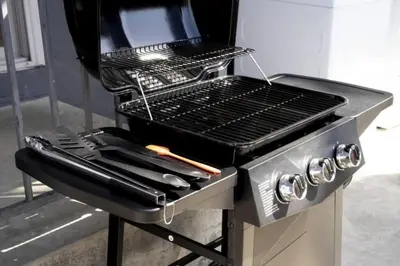 a grill with a bunch of utensils on it at Remodeled Boho 2 Bed Near Zoo and Downtown in San Diego