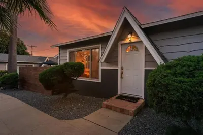 a house with a white door in front of it at Remodeled Boho 2 Bed Near Zoo and Downtown in San Diego