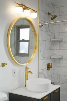 a bathroom with a sink and a mirror at Remodeled Boho 2 Bed Near Zoo and Downtown in San Diego
