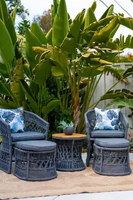 a group of wicker chairs and a table and plants at Outdoor Haven with Spa Walk to La Jolla Shores Beach in San Diego