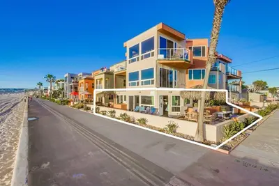 a row of houses on a street next to the beach at Aloha Breeze 1 in San Diego