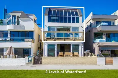 a large building with two levels of water front at Bay Style 2 in San Diego