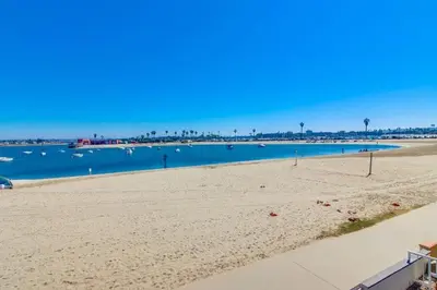 a view of a beach with boats in the water at Bayside 5 in San Diego