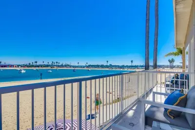 a view of the beach from the balcony of a resort at Bayside 5 in San Diego