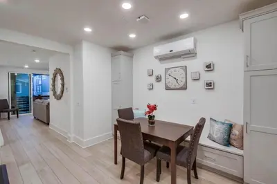 a dining room with a table and chairs at Bayside Cove 1 in San Diego