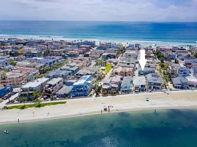 an aerial view of a beach with houses and the ocean at Bayside Cove 3 in San Diego