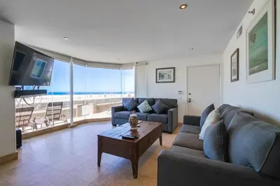 a living room with a couch and a coffee table at Belmont Shores in San Diego