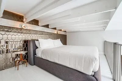 a bedroom with a large bed in a room at Kettner Row 2 in San Diego
