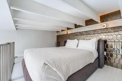 a bedroom with a large bed in a room at Kettner Row 2 in San Diego