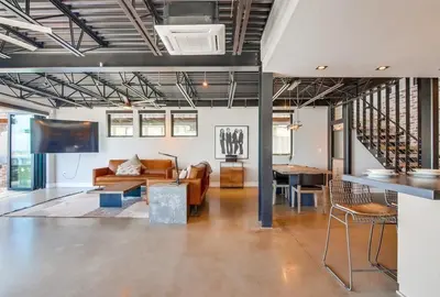 a living room with a couch and a table at Boardwalk 6 in San Diego