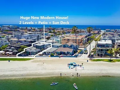 an aerial view of a beach with buildings at Boardwalk 6 in San Diego