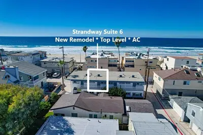 a view of a city with houses and the ocean at Strandway Suite 6 in San Diego