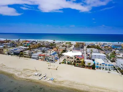 an aerial view of a beach with boats on the sand at Marina 2 in San Diego