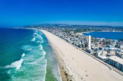 an aerial view of a beach and the ocean at Surf Style 3 in San Diego