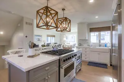 a kitchen with a stove and a counter top at The Shores 4 in San Diego