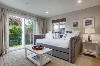 a bedroom with a bed and a large window at The Shores 4 in San Diego