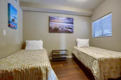 a room with two beds and a window at Waterfront 2 in San Diego