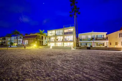 a group of buildings at night at Waterfront 2 in San Diego