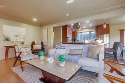 a living room with a couch and a table at Windansea 1 in San Diego