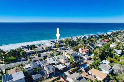 an aerial view of a beach with houses and the ocean at Surf House in Encinitas