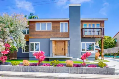 a large house with a landscaping at Windansea 2 in San Diego