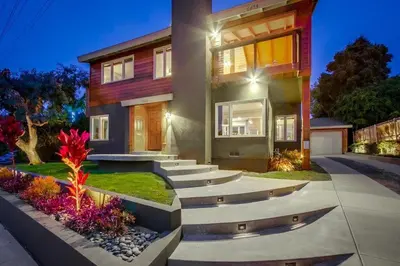 a house with stairs in front of it at Windansea 2 in San Diego