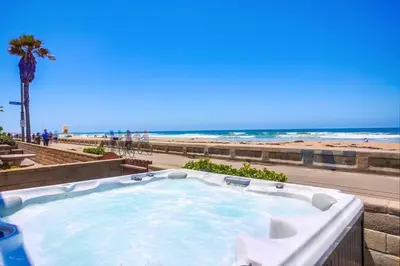 a hot tub with the beach in the background at Life's A Beach 1 in San Diego