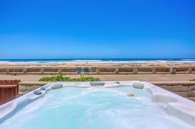 a hot tub with the beach in the background at Life's A Beach 1 in San Diego