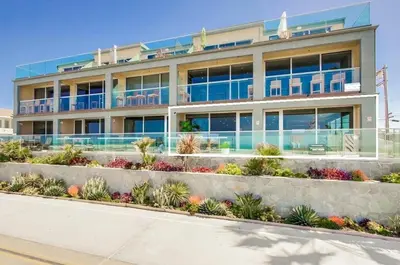 a large building with a lot of windows and plants at Residence Club 1 in San Diego