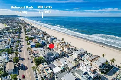 an aerial view of a beach with buildings and the ocean at Strandway Suite 2 in San Diego