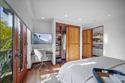 a bedroom with a bed and a desk at Stunning Ocean-View Villa, Walking to La Jolla Cove in San Diego