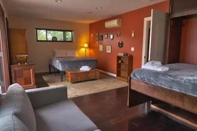 a living room with two beds and a couch at Stunning Home & Spectacular View in La Mesa