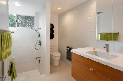 a bathroom with a sink and a shower and a toilet at The Milky Way Modern Desert Retreat in Borrego Springs