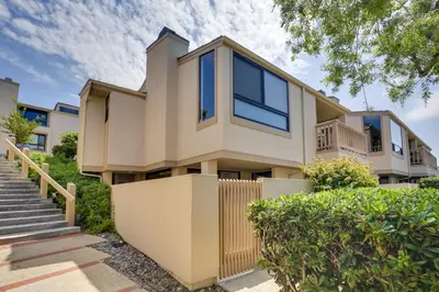 an image of a house with a staircase at Solana Beach Condo with Community Pool, Beach Access in Solana Beach