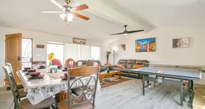 a living room with a ping pong table at Home Ensuite with Panoramic City View in San Diego