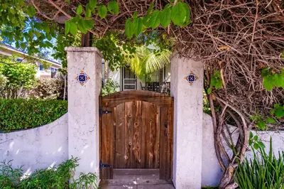 a wooden door in front of a house at North Park Sanctuary in San Diego
