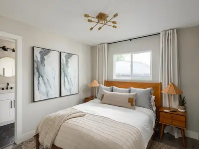 a bedroom with a bed and a window at Peaceful 4br with Fire Pit and Huge Yard in San Diego
