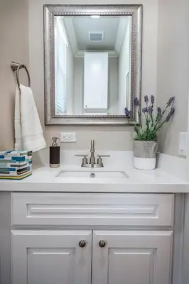 a white bathroom with a sink and a mirror at 4048 Stylish condo in Hillcrest Mission Hills in San Diego