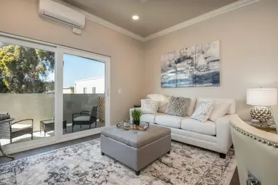 a living room with a couch and a table at 4046 Modern condo in Hillcrest Mission Hills in San Diego