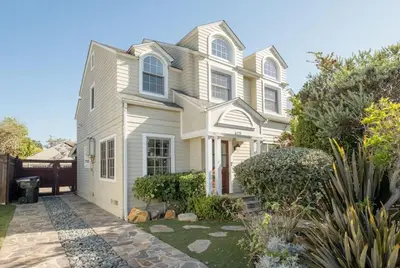 a white house with a yard at 4221 Urban oasis in Hillcrest Mission Hills in San Diego