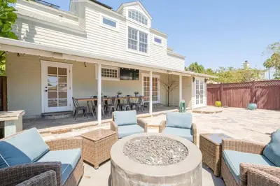 a patio with chairs and a table in front of a house at 4221 Urban oasis in Hillcrest Mission Hills in San Diego