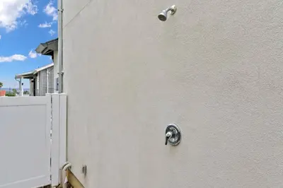 a white door with a handle on a house at Saratoga Sunset - Rooftop - Sleek - Walk to Beach in San Diego