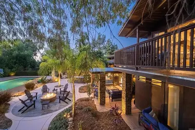 a house with a patio and a swimming pool at Private Resort in Lake Hodges in Escondido