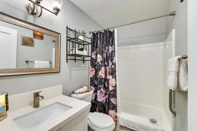 a bathroom with a sink and a toilet and a shower at San Diego Condo Pool Access, 8 Mi to Downtown in San Diego