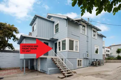 a house with a sign in front of it at Bankers Hill Chic Roomy Home Near Airport in San Diego