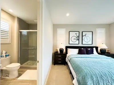 a bedroom with a bed and a shower and a toilet at Close to UCI 4b&4b villa Irvine eastwood in Irvine